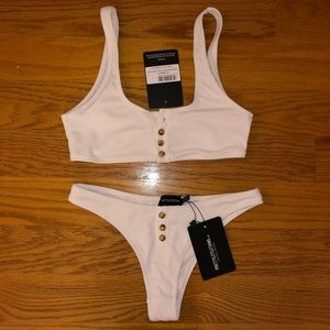 BRAND NEW pretty little things white bathing suit